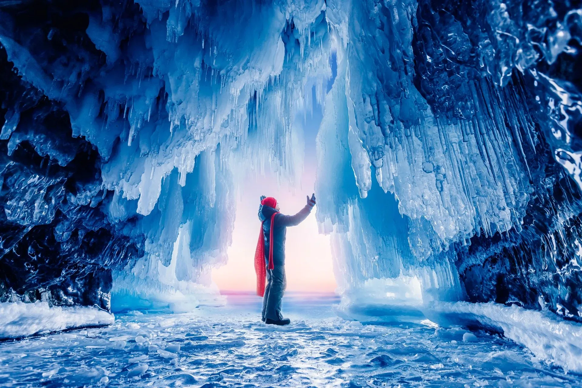 A traveler inside a glacier ice cave